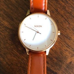 Nixon women’s Kensington rose gold and white watch